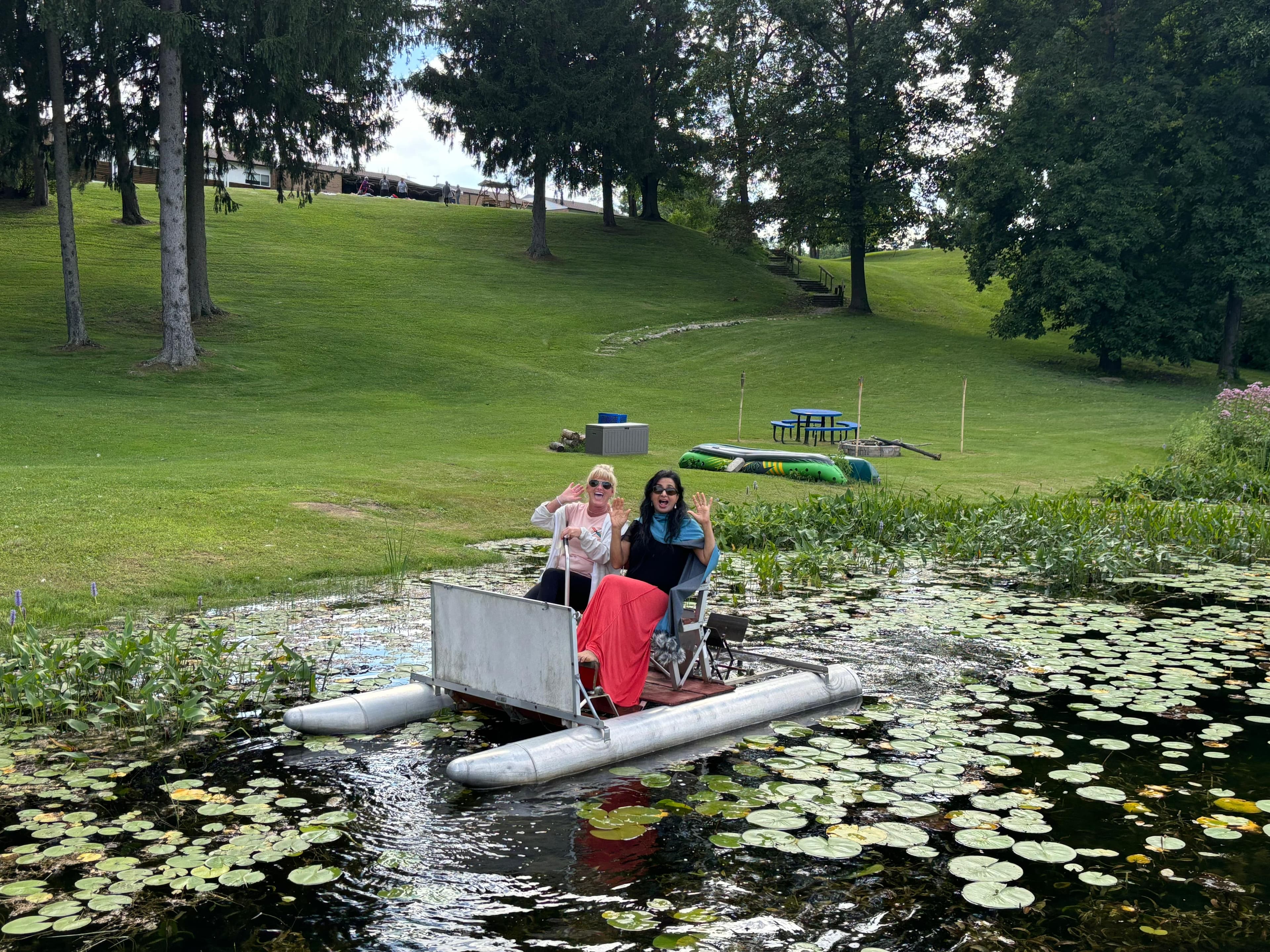 Friends sharing time on the retreat pond